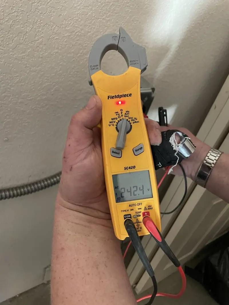 Voltage testing with clamp meter during Aluminum Wiring Replacement in Lynbrook